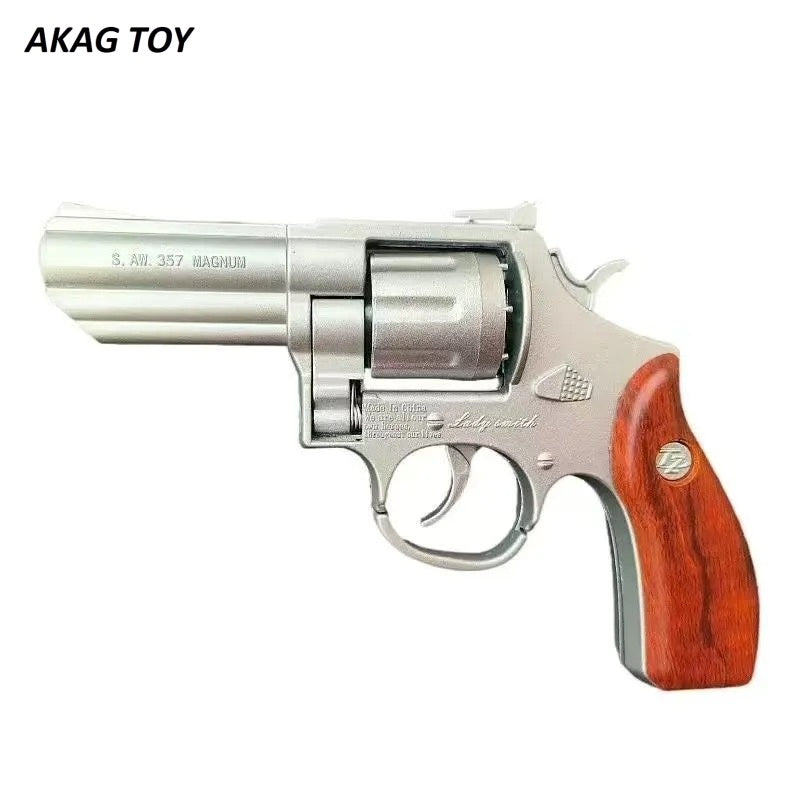 Bright silver revolver toy gun