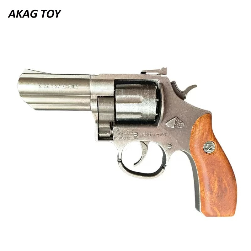 Vintage silver revolver smashing gun