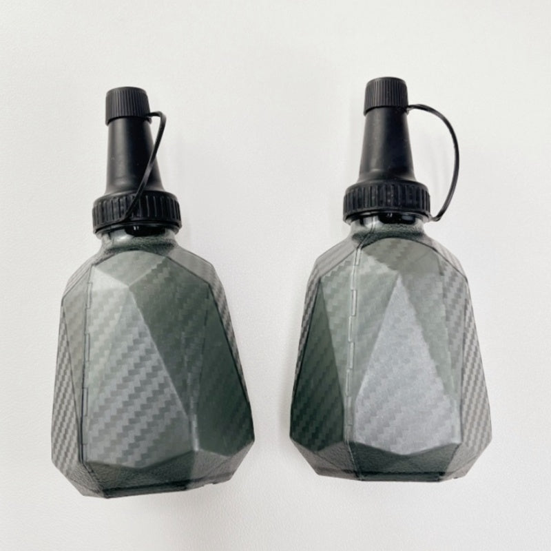 Two black gel ball bottles