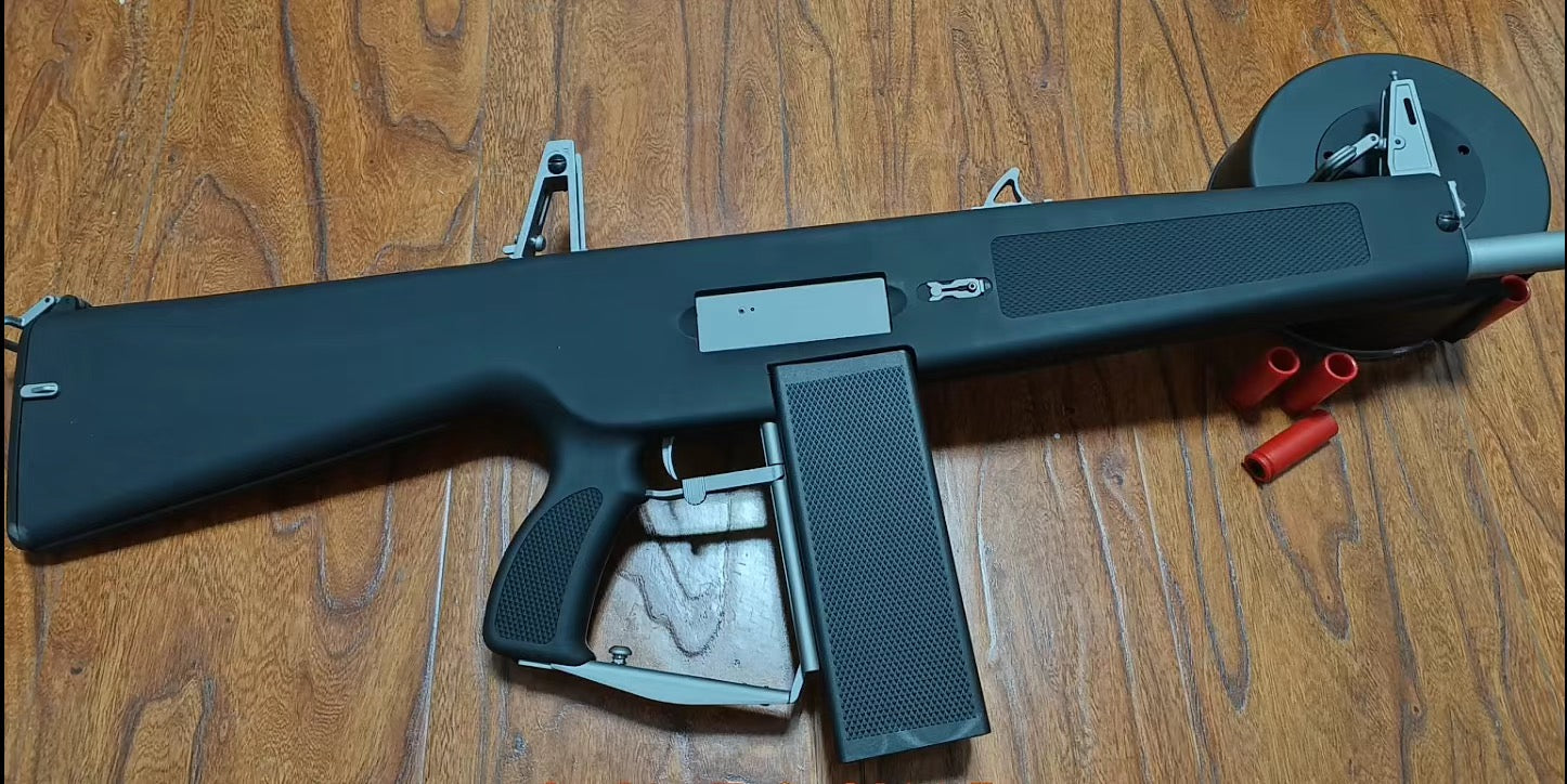aa-12-black-shell-ejecting-shotgun