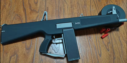 aa-12-black-shell-ejecting-shotgun