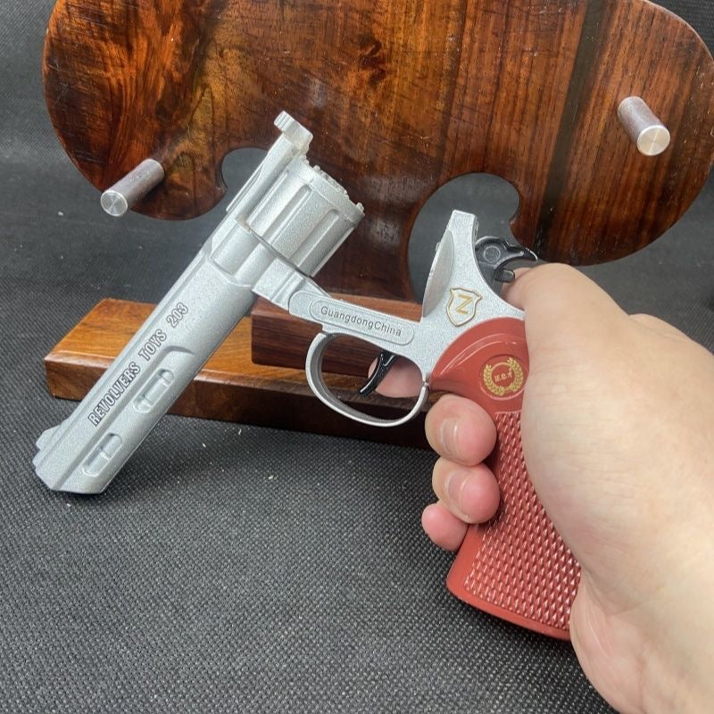 Silver revolver gun
