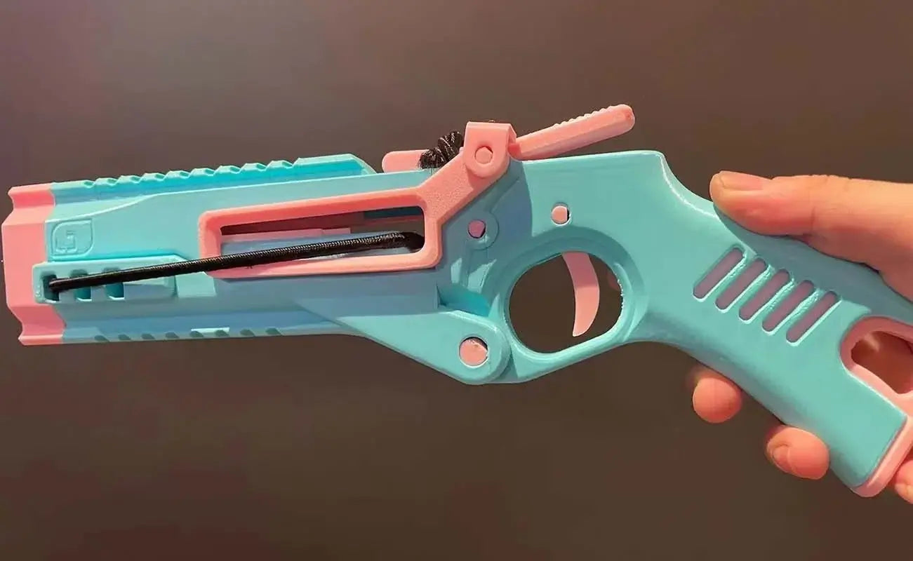 3D printed light green toy gun