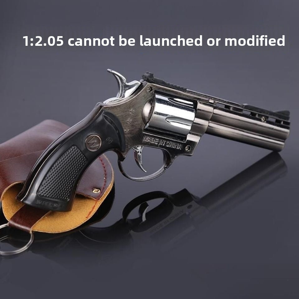 Vintage Rotating Metal Revolver Toy Model – AKAG TOY
