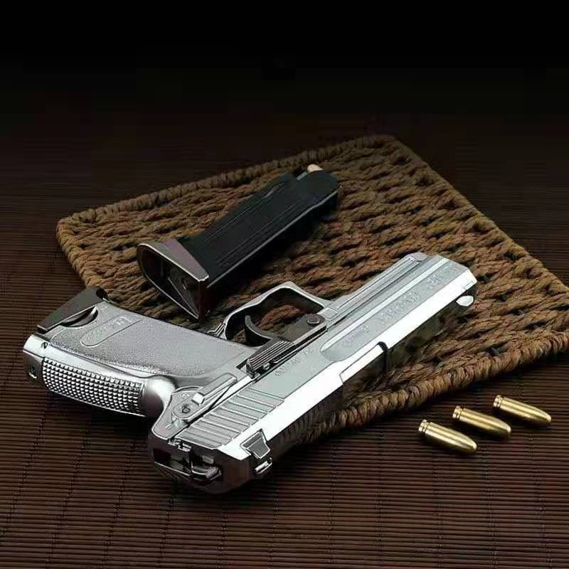 USP silver pistol model